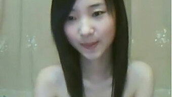 A Petite Chinese Webcam Performer Pleasuring Herself With Her Fingers