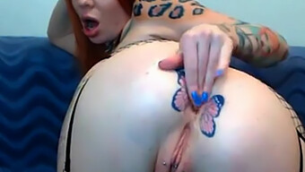 Inked Beauty Shows Off Her Butterfly Tattoo On Webcam